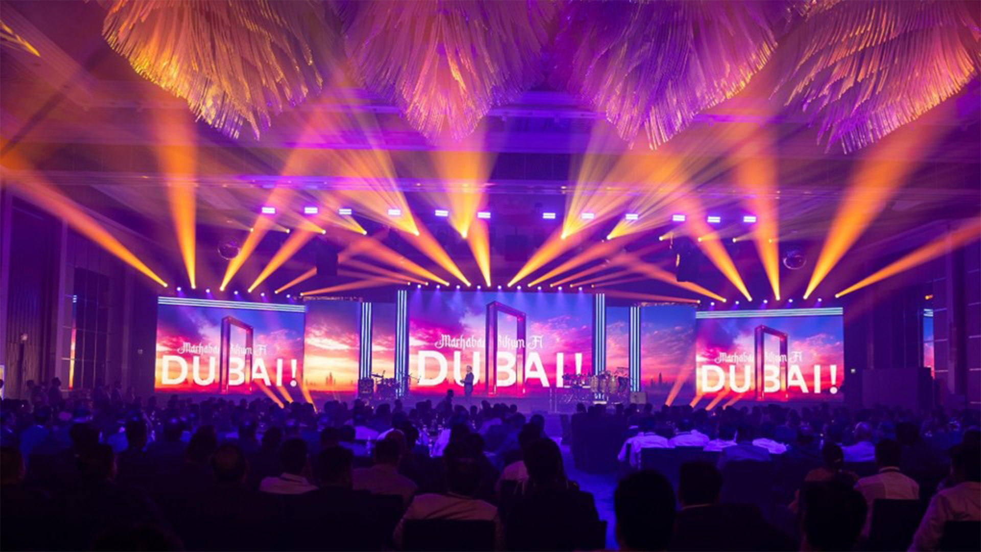 Large scale event production with dramatic stage lighting